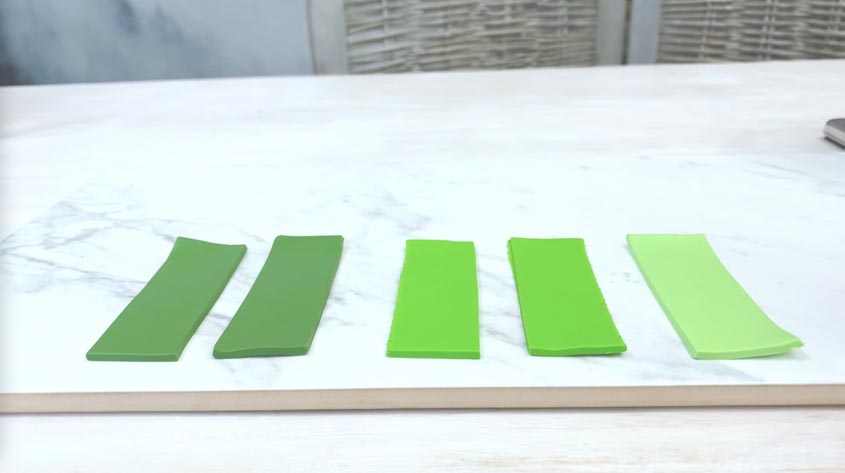 5 variations of green sheets of clay