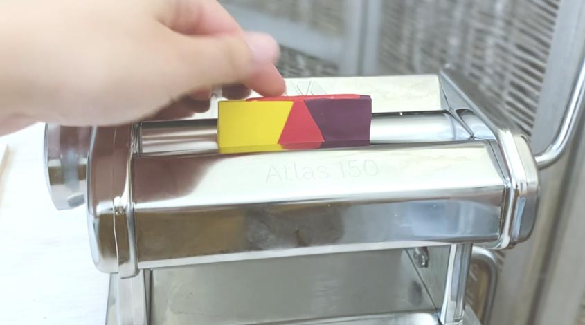 folded skinner blend feeding through pasta machine